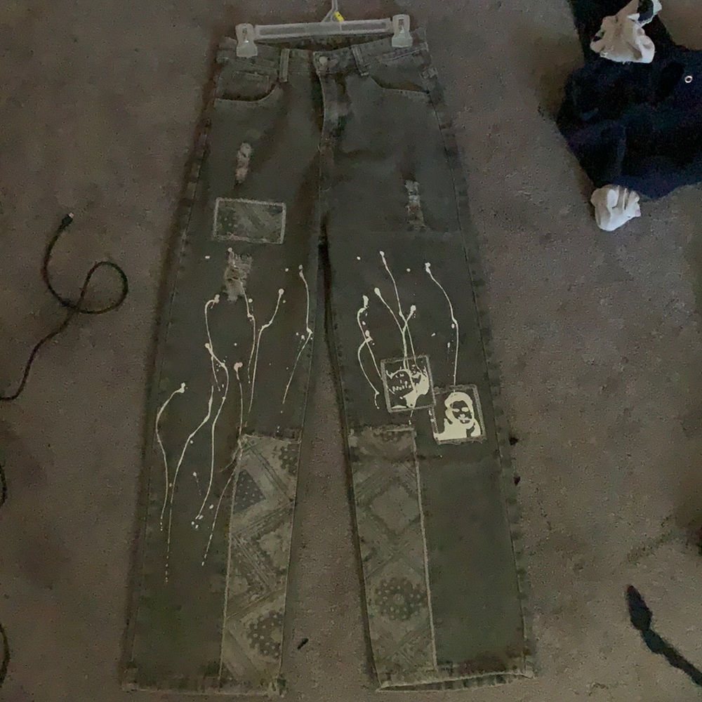 Vintage black jeans with graphic designs. Never been worn.